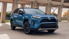Passenger's side front angle view of Cavalry Blue 2022 Toyota RAV4