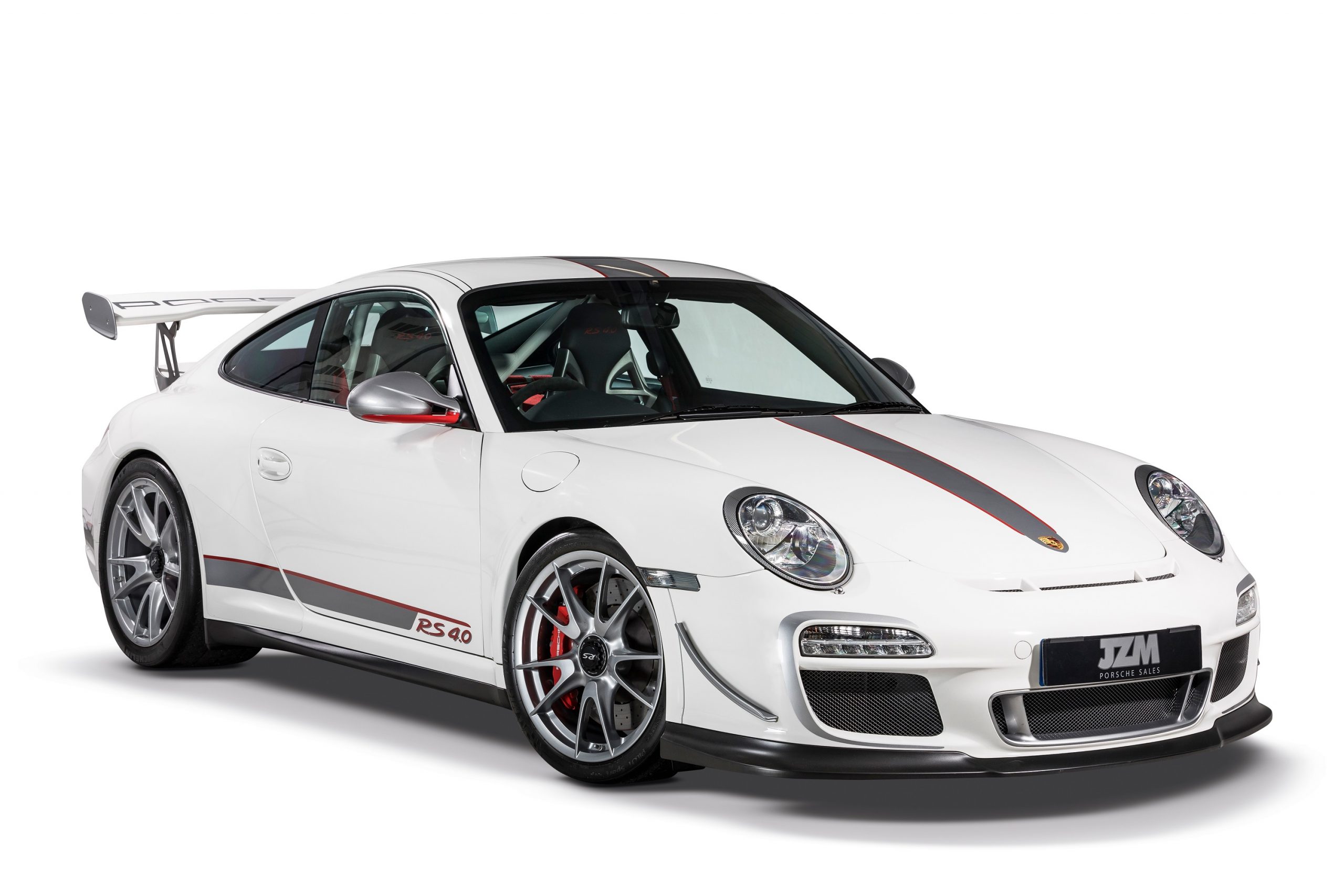 A white Porsche 911 GT3 RS 4.0 shot from the front 3/4