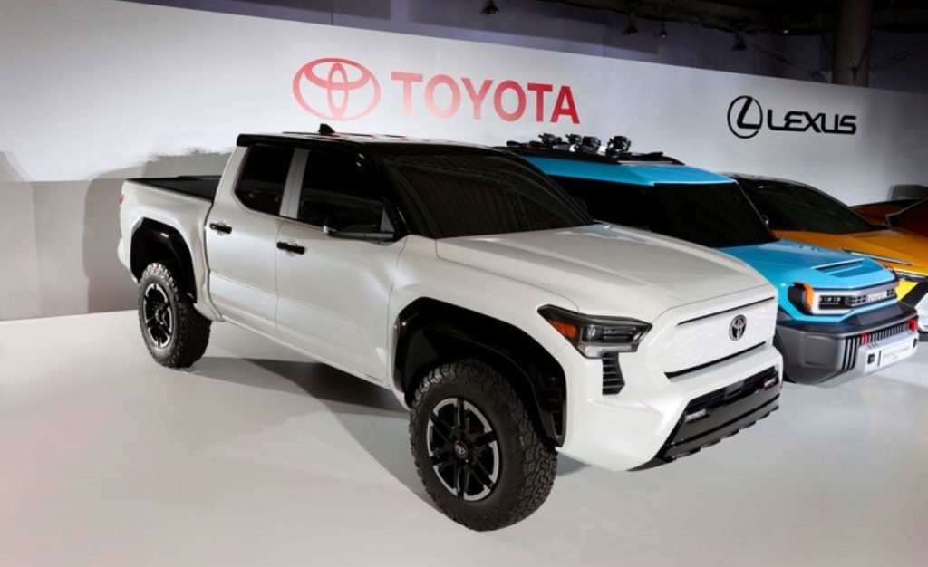 Possible Toyota Tacoma EV concept electric pickup truck parked next to other Toyota electric concept vehicles
