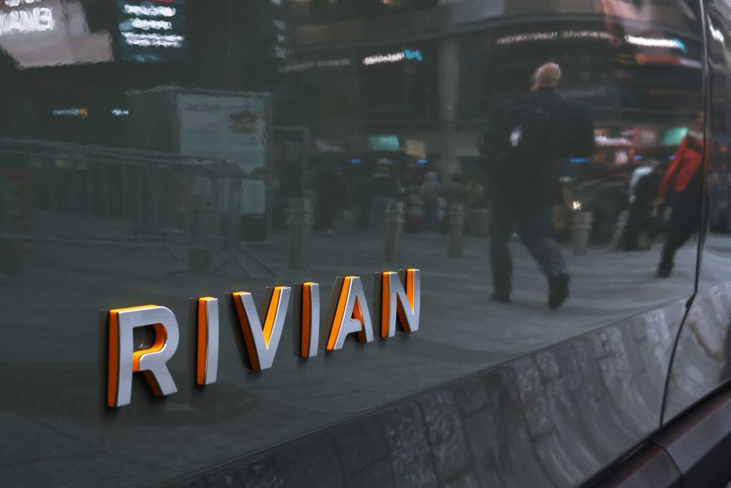 Rivian logo on the back of a Rivian vehicle. 