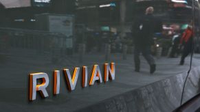 Rivian logo on the back of a Rivian vehicle.