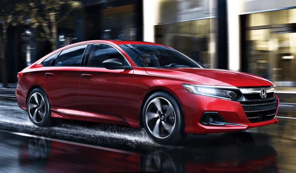 San Marino Red 2022 Honda Accord Sport Special Edition driving on a wet street