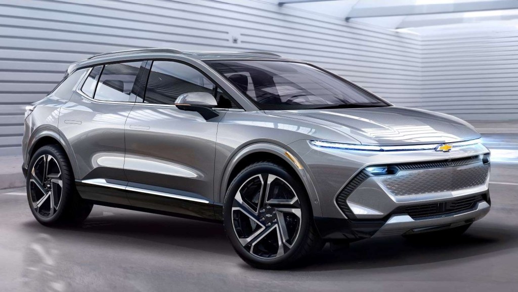 Silver 2024 Chevy Silverado EV parked in a parking garage