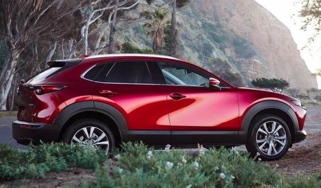 Soul Red Crystal Metallic 2022 Mazda CX-30 parked on the side of the roadv
