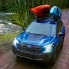A blue Subaru Foresyer Wilderness