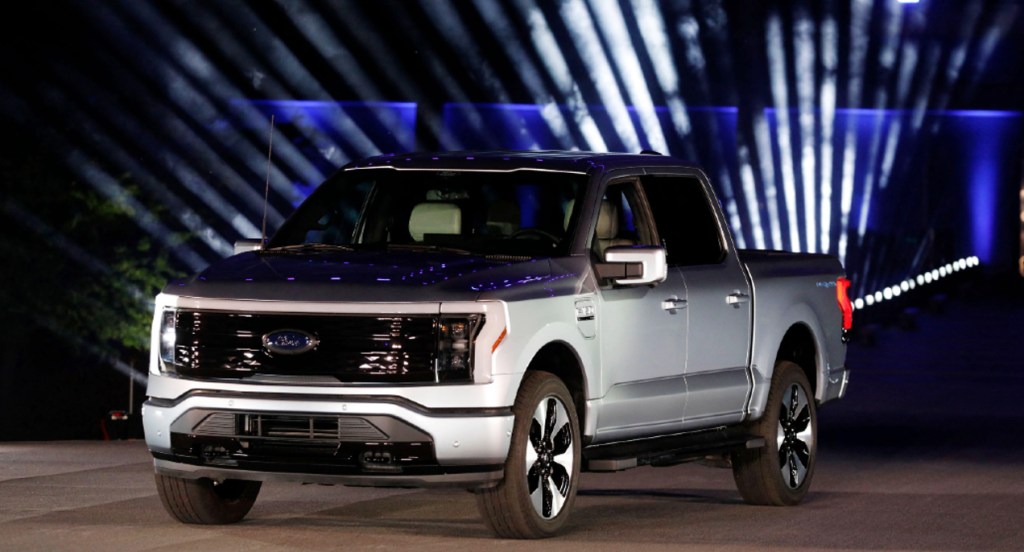A gray Ford F-150 Lightning electric truck is on display.