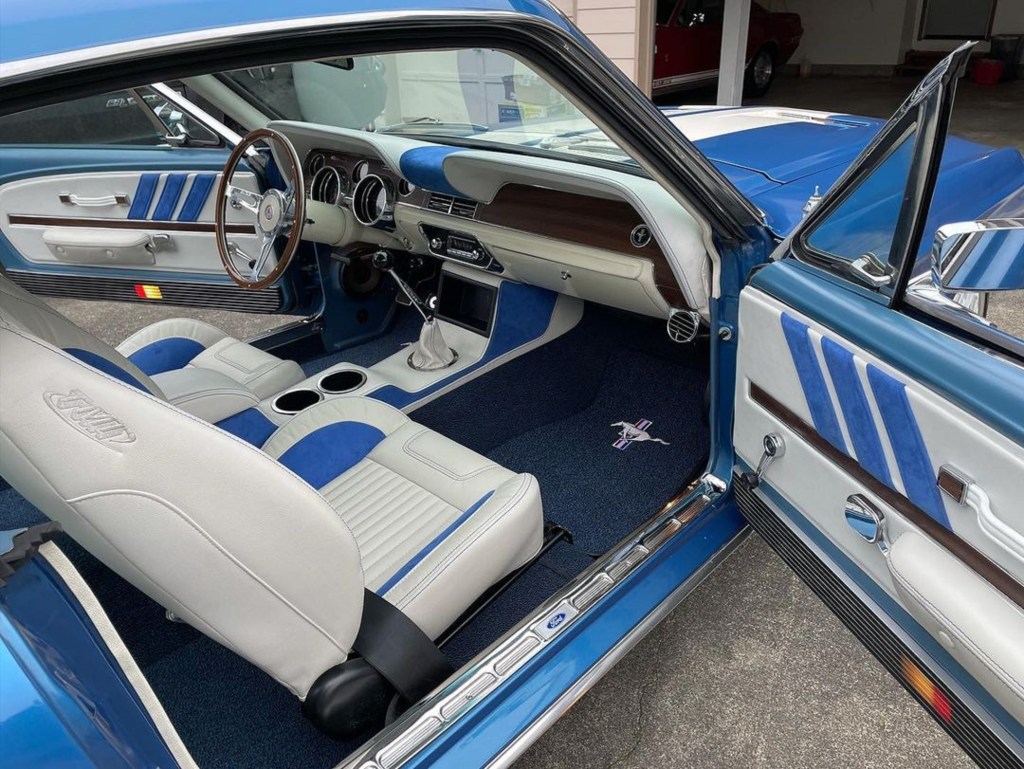 The white-and-blue-leather interior of Tim Keptner's blue-and-white 1968 Ford Mustang Fastback restomod