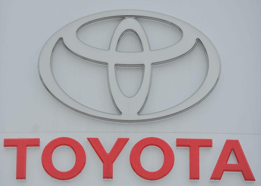 A Toyota logo with Toyota written in red underneath.