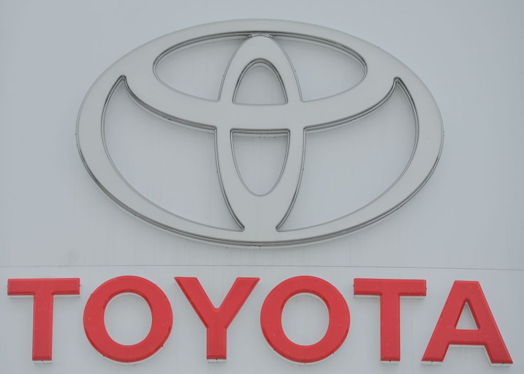 A Toyota logo with Toyota written in red underneath.