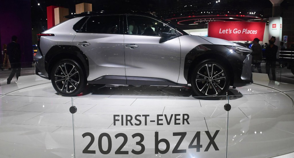 A gray 2023 Toyota bZ4X electric SUV model is on display. 