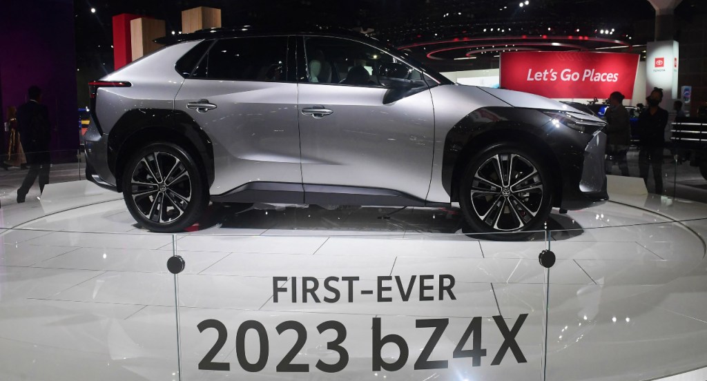 A gray 2023 Toyota bZ4X electric SUV model is on display.