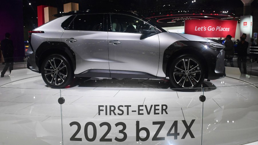A gray 2023 Toyota bZ4X electric SUV is on display.
