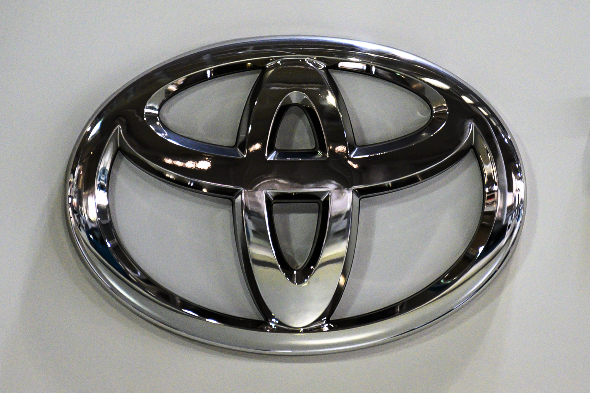 Toyota's logo, who recently attempted to introduce in-car subscription services