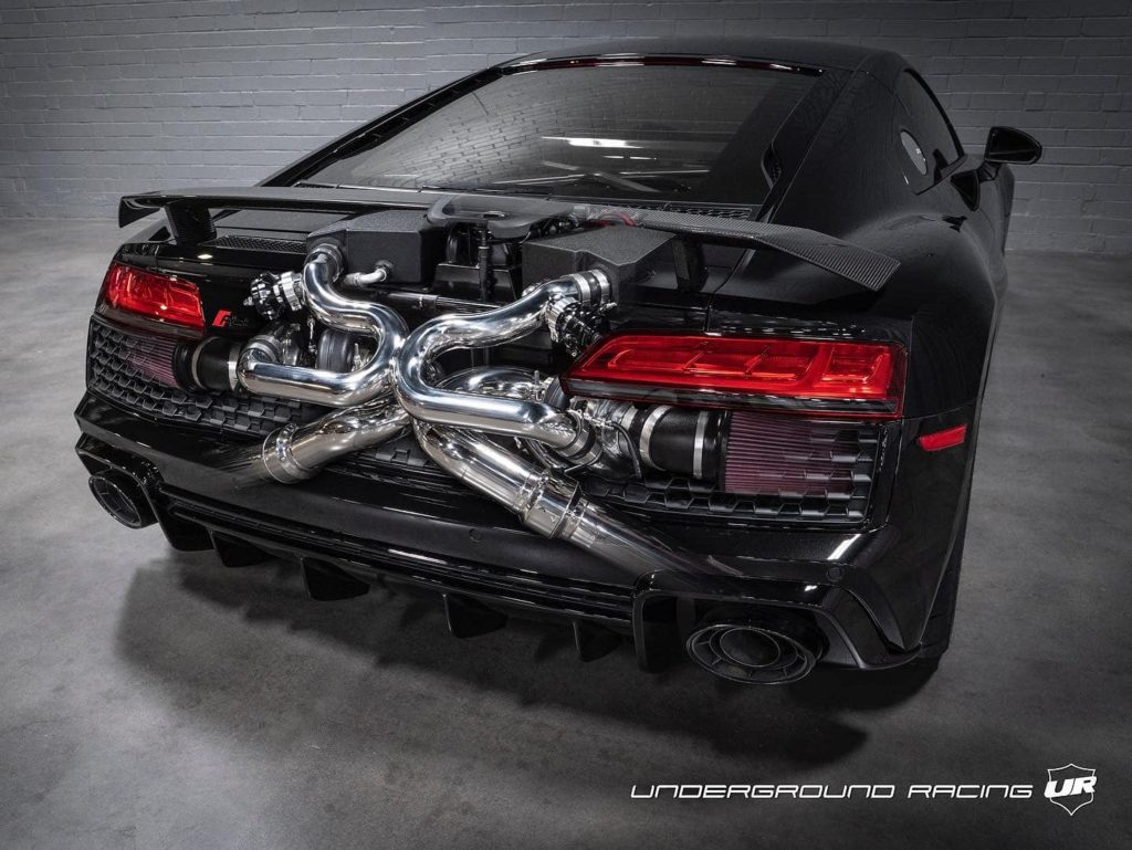 A see-through rear 3/4 view of the twin-turbocharged V10 engine in Underground Racing's black 1500-hp 2020 Audi R8 Decennium