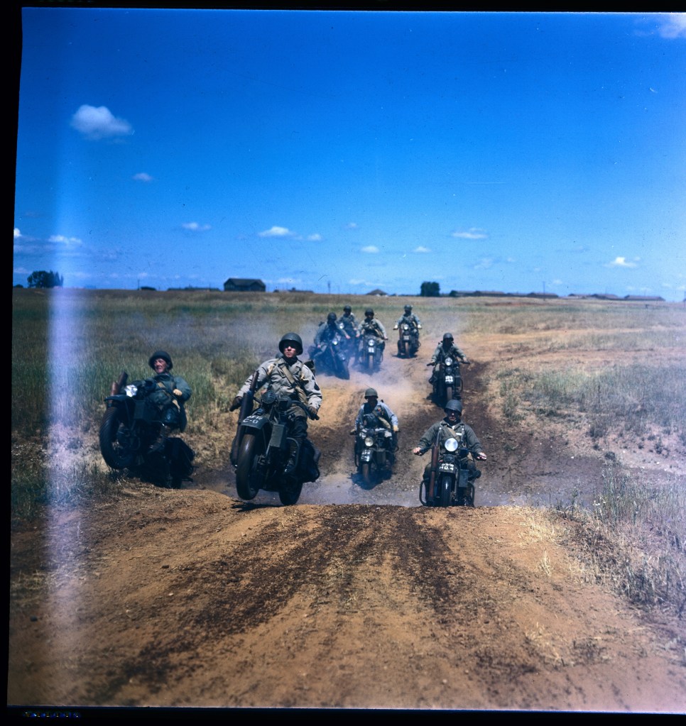 WW2 US soldiers testing Harley-Davidson XAs in a muddy field