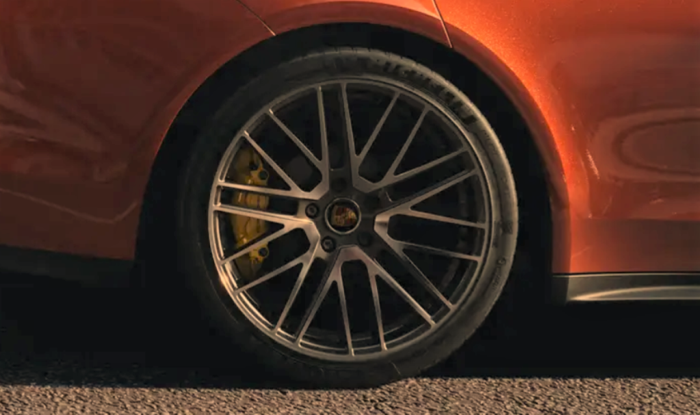 Wheel on fully loaded new Papaya Metallic 2022 Porsche Panamera Turbo S E-Hybrid Executive trim