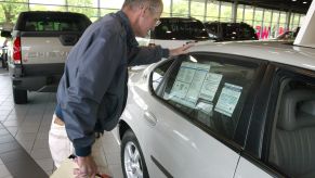 Auto dealership sales incentives on new and old resale vehicles