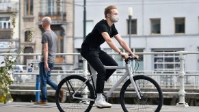 a man rides and electric bike in Belgium