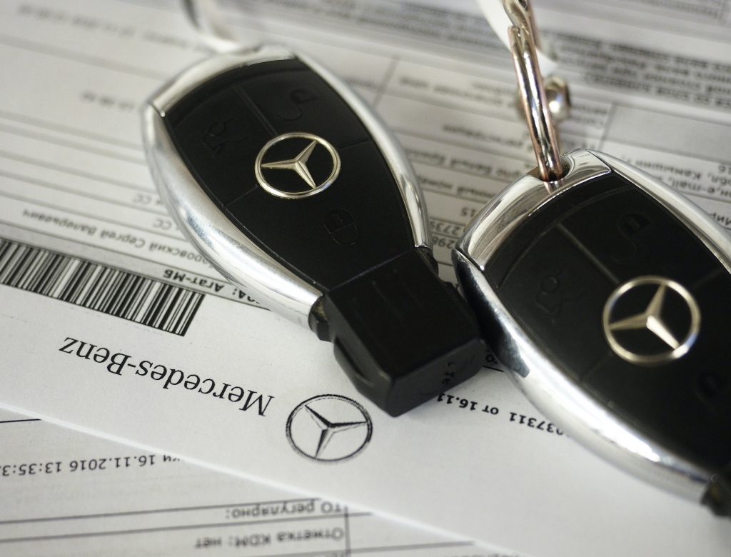  Key chains bearing the Mercedes-Benz logo at a Mercedes-Benz car dealership