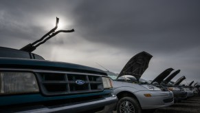 Is it best to fix your used car like the ones photographed here, or should you get a new car?