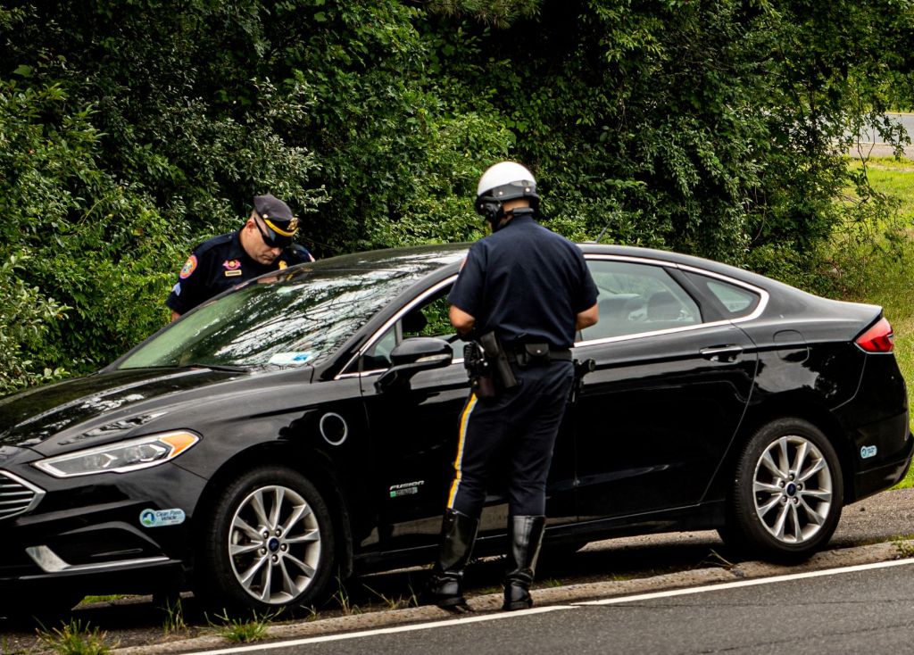 Highway Patrol police officers pulling over a car in Nassau County, New York