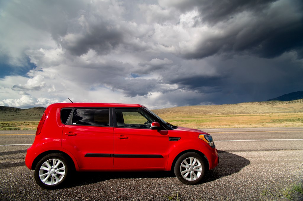 This Red Kia Soul on the road is one of the best used cars for under $20,000