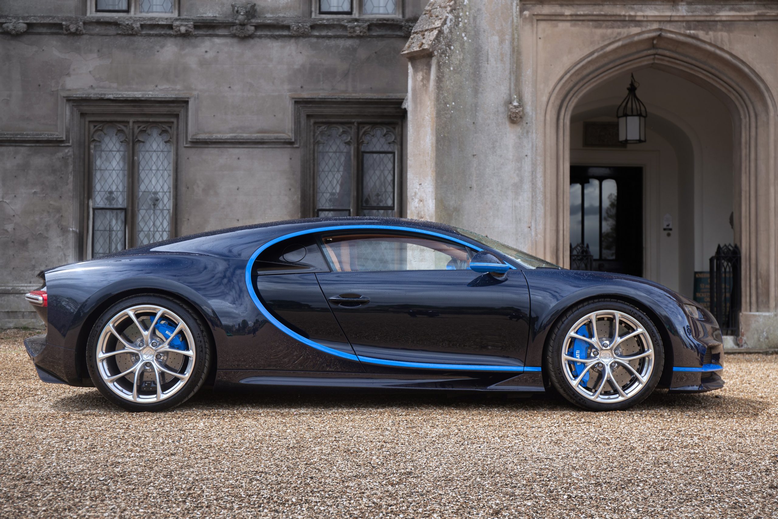 A profile shot of a Chiron in front of an English manor