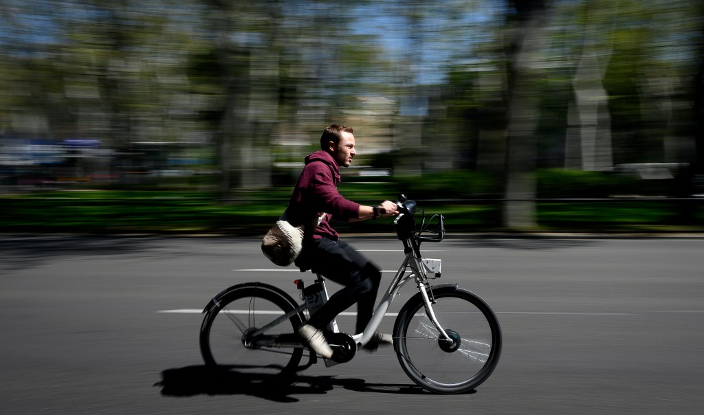  A man rides an e-Bike in Madrid, Spain. 