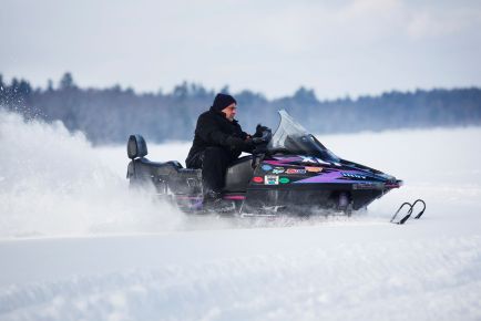 When Is It Safe to Drive a Snowmobile Over a Frozen Lake?