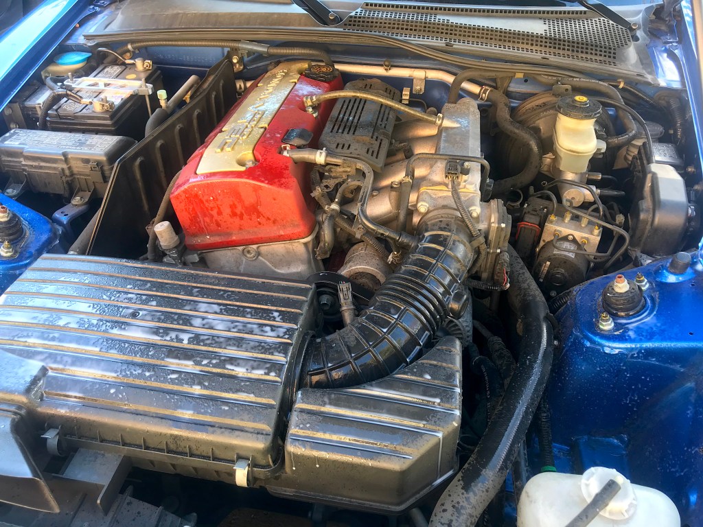 I sprayed down the engine bay with the tire shine. Although, not in even coats.