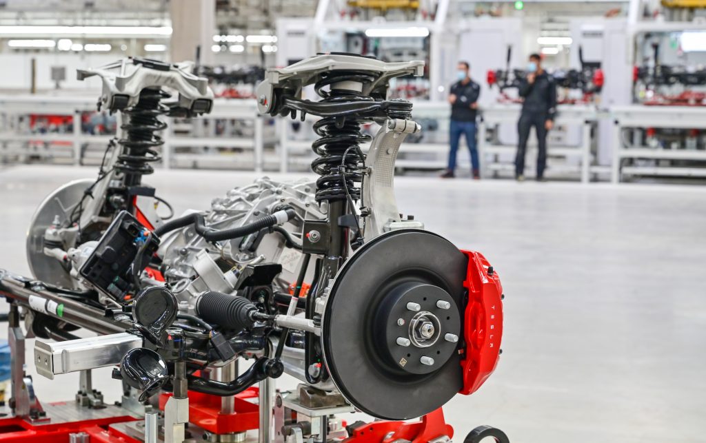 The drive with the axle of a Tesla Model Y is seen at the open day in a production hall of the Tesla Gigafactory. 