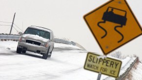 An SUV drives on an icy road in Toledo, Ohio, in winter 2005