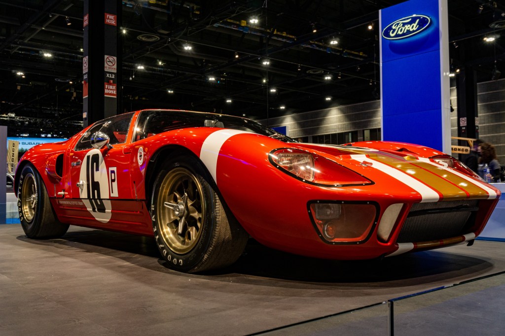 The red-and-gold 1966 Ford GT40 Mk I Lightweight 'AM GT-1'