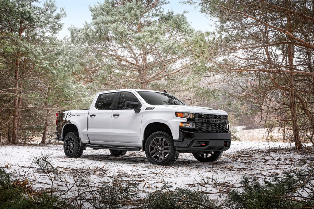 2021 Chevrolet Silverado Realtree Edition parked in some snowy woods