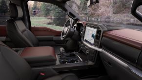 Interior of the 2021 Ford F-150 full-size pickup truck showing infotainment screen and technology features