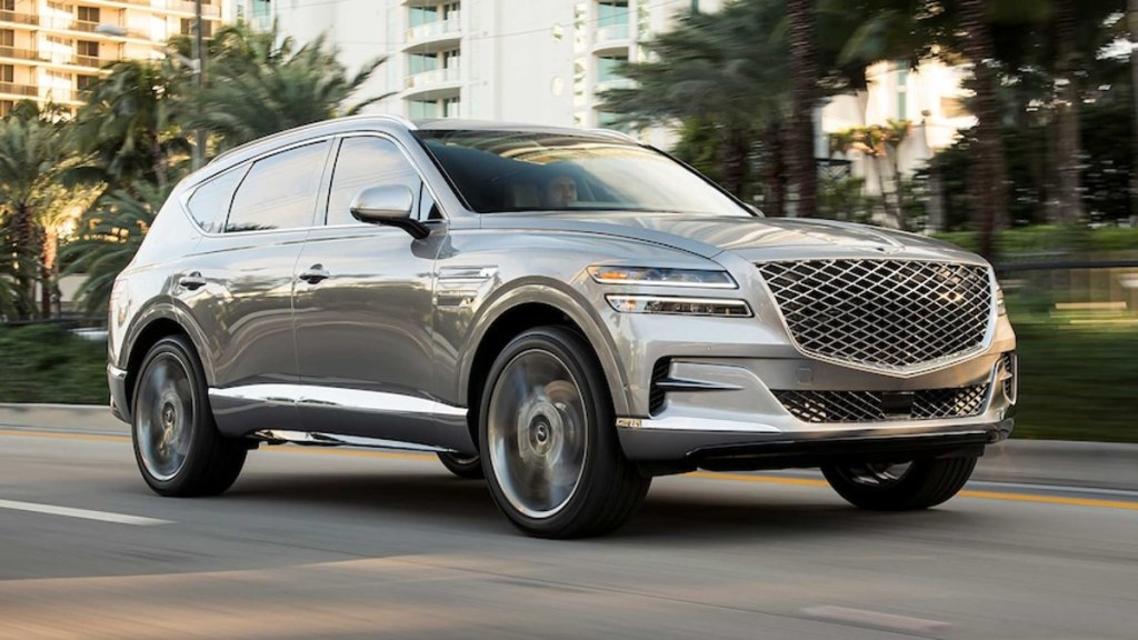 Sand colored 2021 Genesis GV80 posed, MotorBiscuit's SUV of the year winner just got more luxurious.