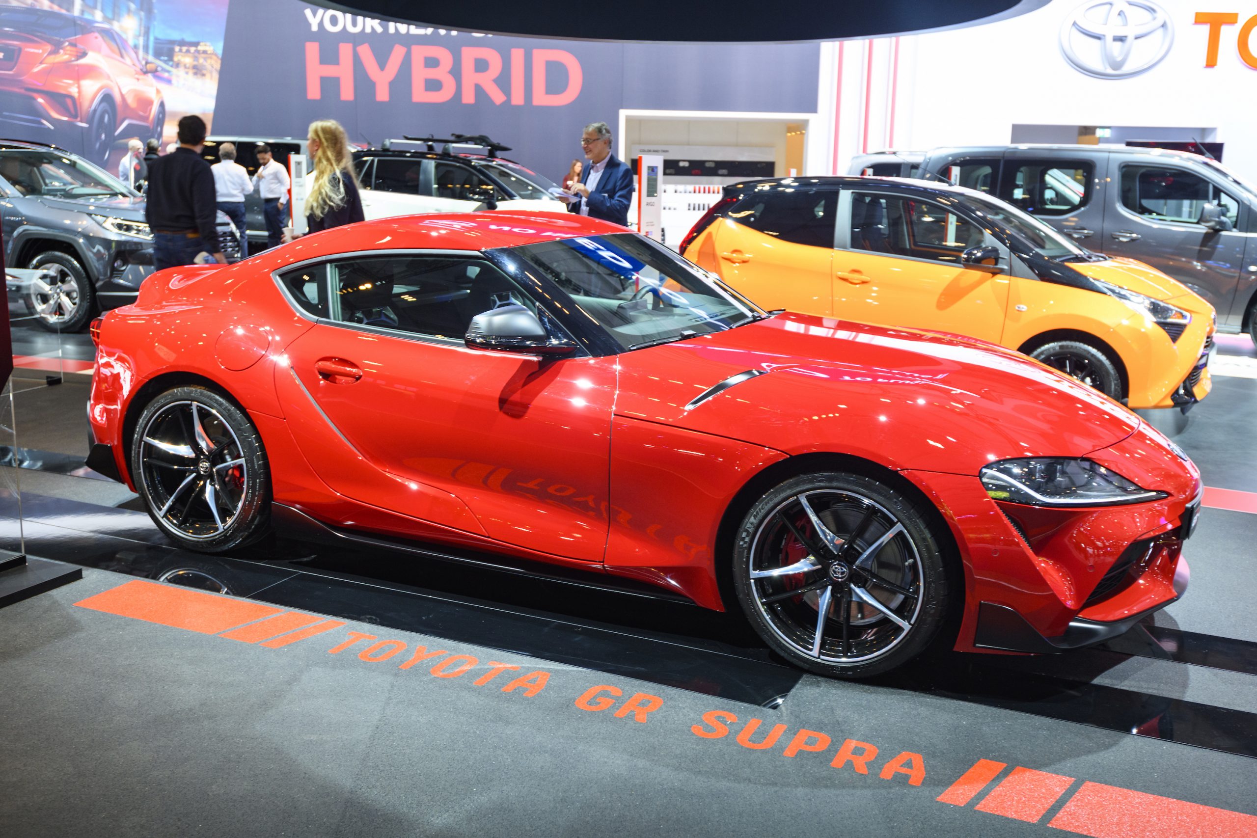2021 Toyota Supra in red at a car show