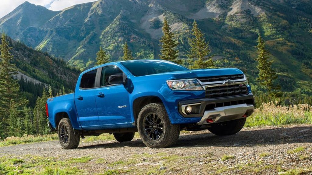 Blue 2022 Chevrolet Colorado on a trail, most frequently asked questions about the midsize pickup truck, answered.