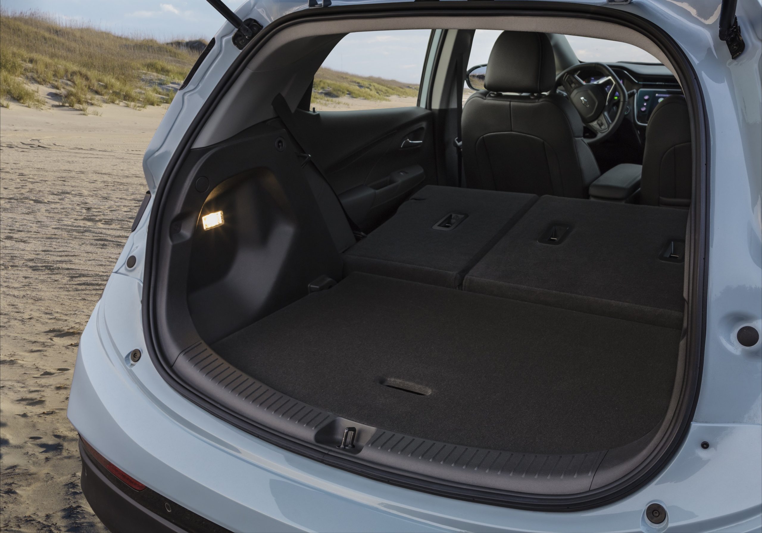 The rear hatch of a Chevy Bolt EV with the seats down