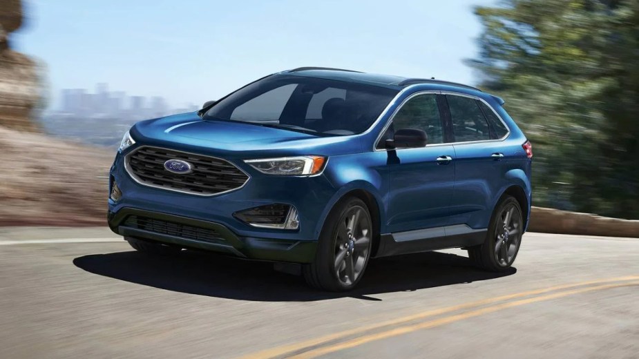 Blue 2022 Ford Edge midsize SUV on the road