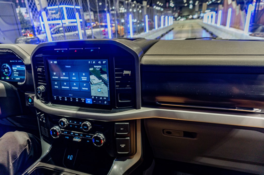 The dashboard of a 2022 Ford F-150 Lightning on the 2022 Chicago Auto Show test track