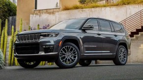 A gray 2022 Jeep Grand Cherokee is parked.