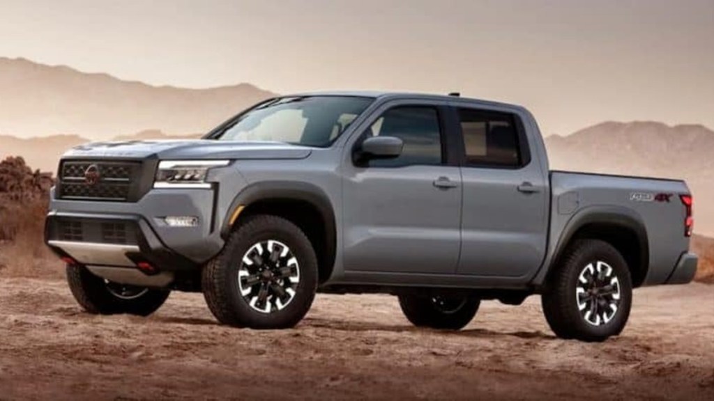 2022 Nissan Frontier midsize truck posed on dirt trail