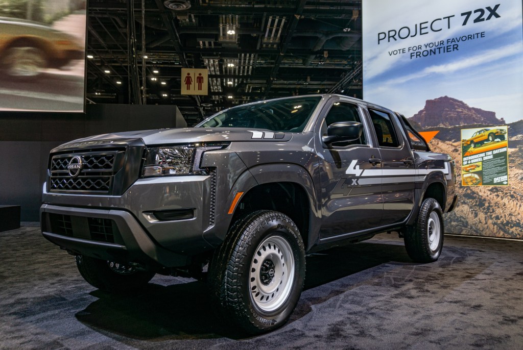 The front 3/4 view of the gray-and-white 2022 Nissan Frontier Project 72X at the Chicago Auto Show