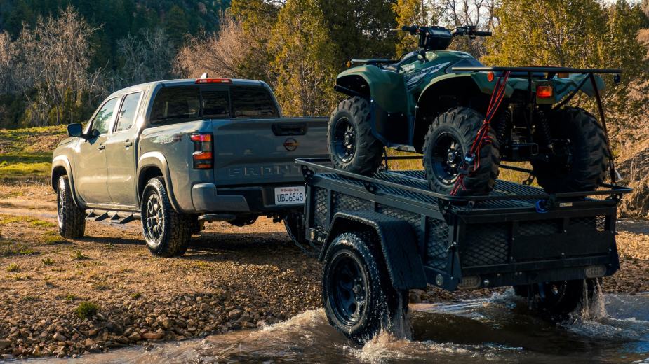 A 2022 Nissan Frontier towing an ATV on a trailer. Which trim level is the best?