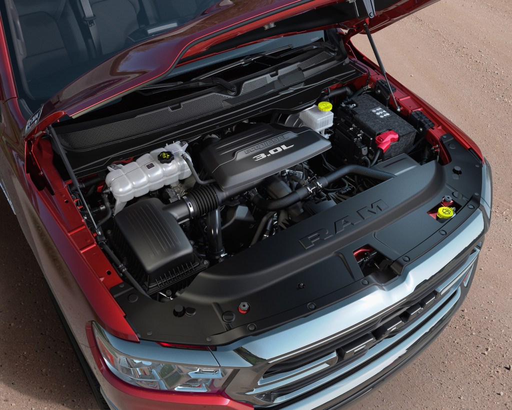 The engine bay of a Ram 1500 truck with the 3.0L EcoDiesel V6 visible.