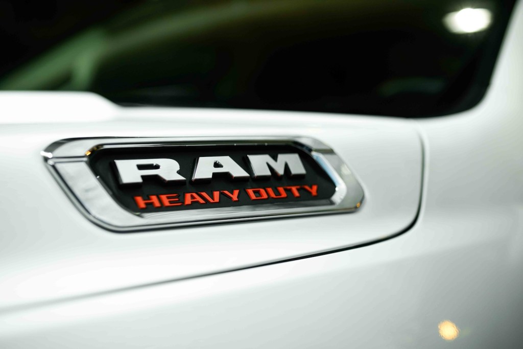 The "Heavy Duty" hood badge on a 2022 Ram 4000 with manual transmission.