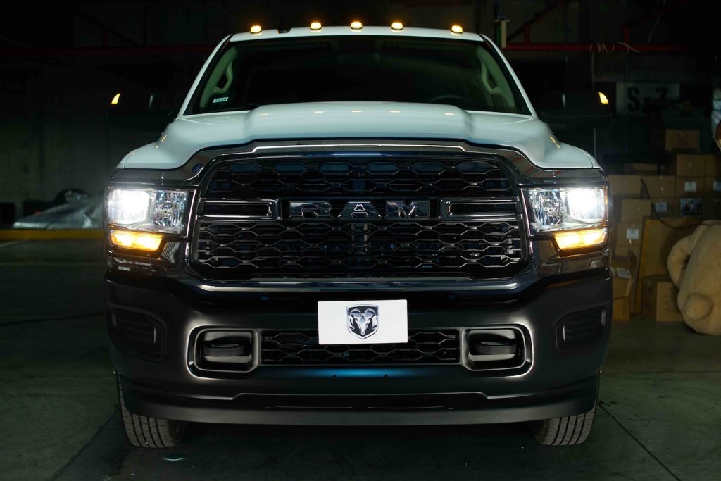 The grille and bumper of a RAM 4000 work truck