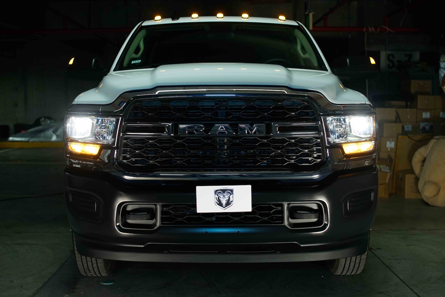 The grille and bumper of a RAM 4000 work truck with V8 and stick shift sold in Mexico.