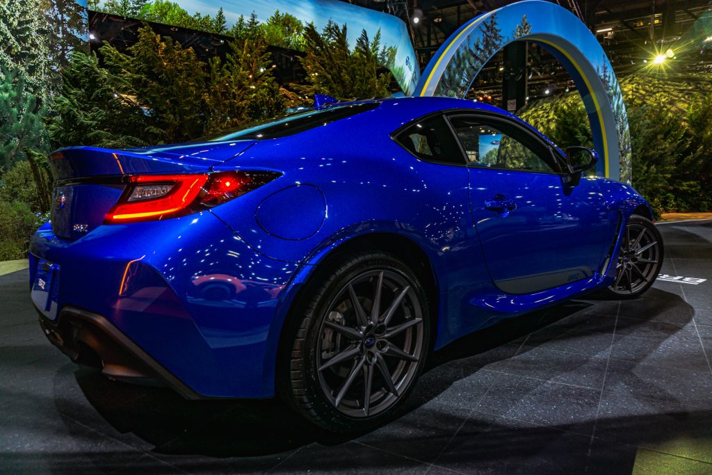 The rear 3/4 view of a blue 2022 Subaru BRZ Limited at the 2022 Chicago Auto Show